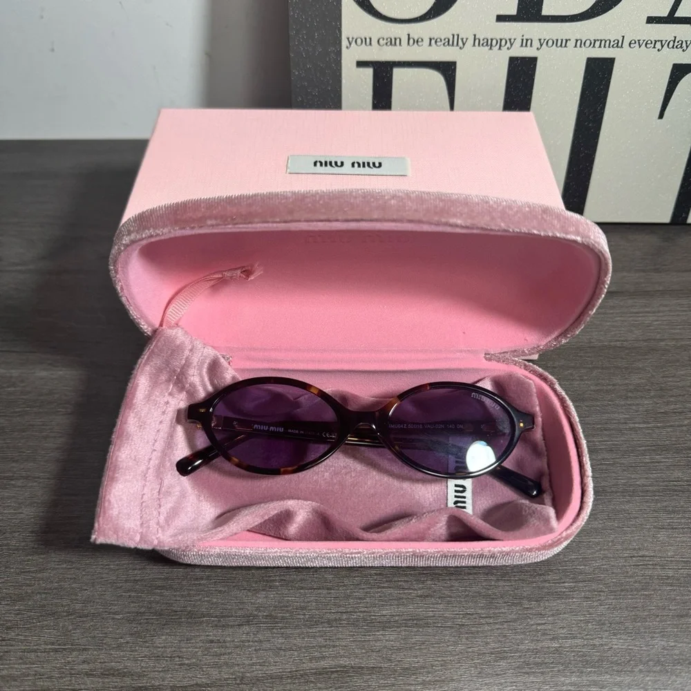 Miu Miu Tortoiseshell Oval Sunglasses with Purple Lenses - Picture 2 of 8